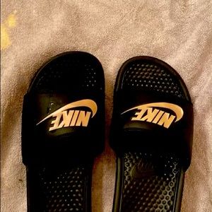 Black Nike slides